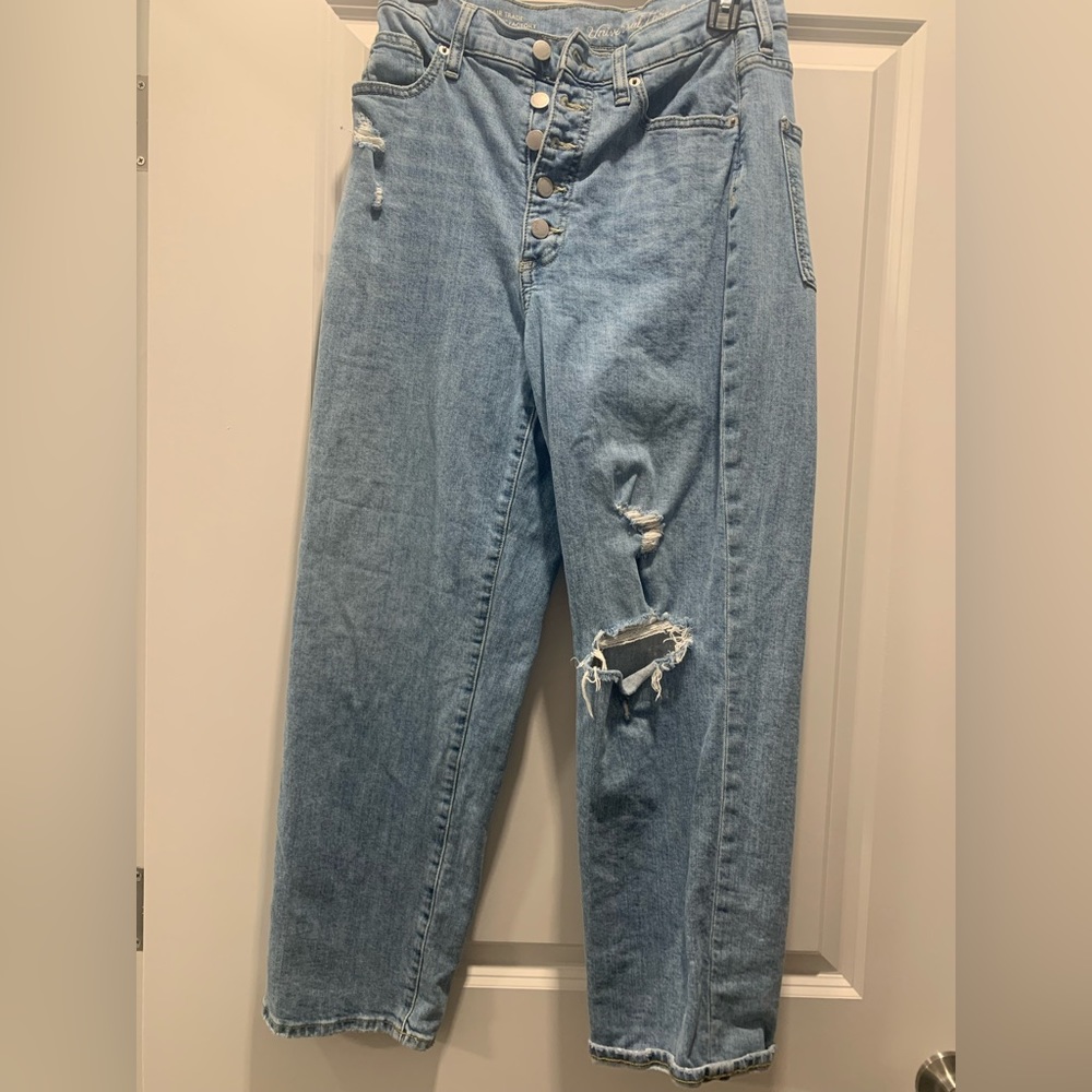 Ripped knee button up jeans